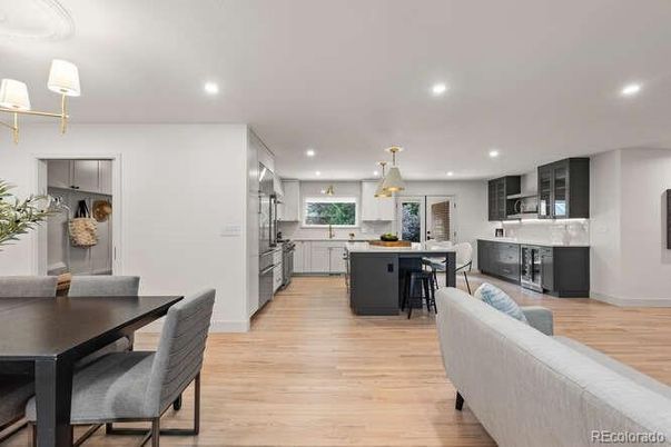 Dining room, Interior, Kitchen, Pendant Lights, Recessed Lighting, Stainless Steel Appliances, Wood Texture Flooring