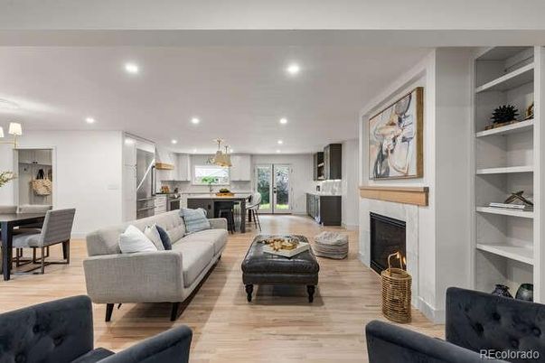 Chandelier, Dining room, Fireplace, Interior, Kitchen, Living room, Pendant Lights, Recessed Lighting, Wood Texture Flooring
