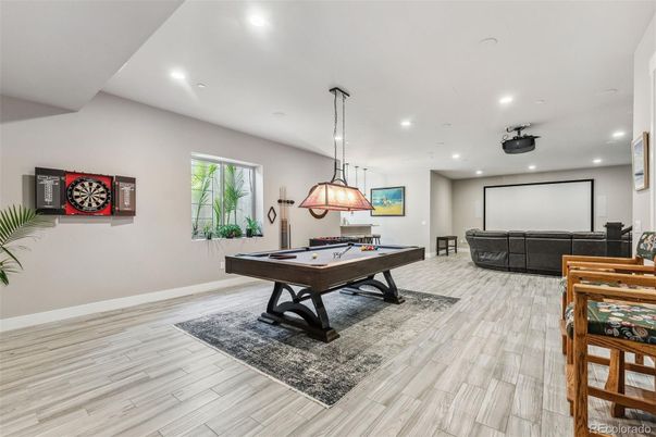 Billiard Table, Game Room, Interior, Pendant Lights, Projection Screen, Recessed Lighting, Wood Texture Flooring