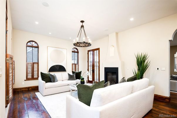 Chandelier, Fireplace, Interior, Living room, Pendant Lights, Recessed Lighting, Wood Texture Flooring