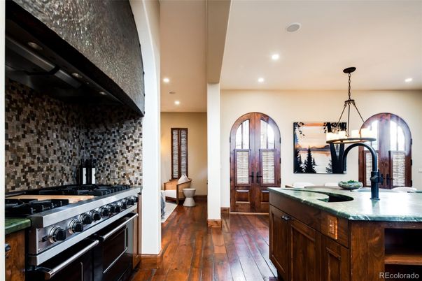 Chandelier, Interior, Kitchen, Pendant Lights, Recessed Lighting, Stainless Steel Appliances, Wood Texture Flooring