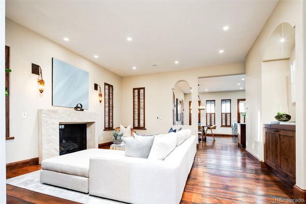 Dining room, Fireplace, Interior, Living room, Pendant Lights, Recessed Lighting, Wood Texture Flooring