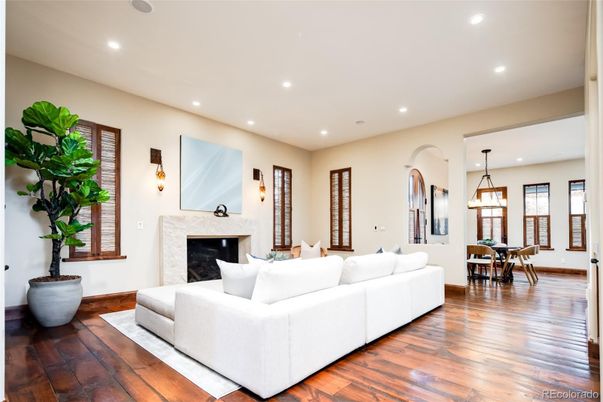Dining room, Fireplace, Interior, Living room, Pendant Lights, Recessed Lighting, Wood Texture Flooring