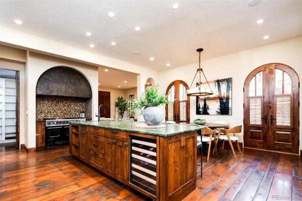Dining room, Interior, Kitchen, Pendant Lights, Recessed Lighting, Stainless Steel Appliances, Wood Texture Flooring