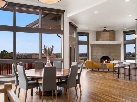 Dining room, Fireplace, Interior, Living room, Pendant Lights, Recessed Lighting, Stone Walls, Wood Texture Flooring