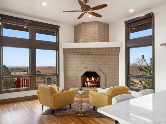 Fireplace, Interior, Living room, Recessed Lighting, Stone Walls, Wood Texture Flooring