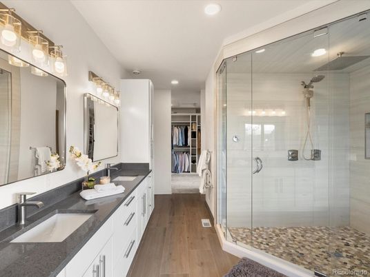Bathroom, Dual Sink Vanities, Glass Shower, Interior, Recessed Lighting, Walk-in Closets, Wood Texture Flooring