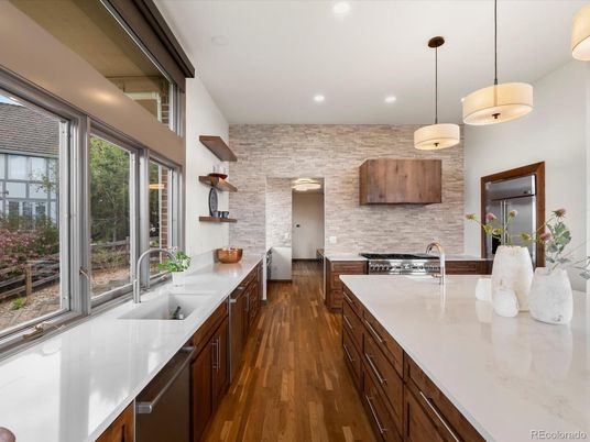 Interior, Kitchen, Pendant Lights, Recessed Lighting, Stainless Steel Appliances, Stone Walls, Wood Texture Flooring