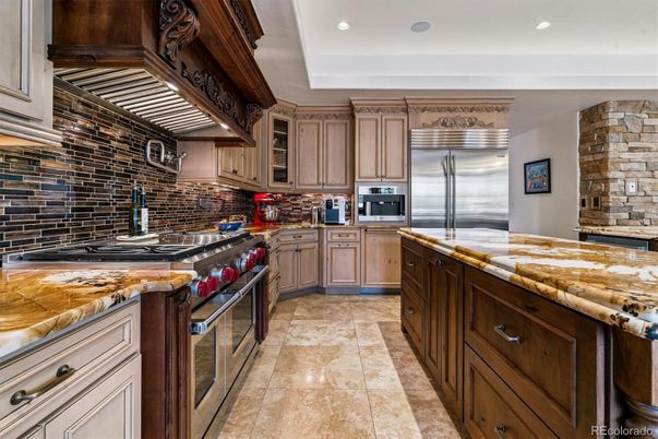 Interior, Kitchen, Recessed Lighting, Stainless Steel Appliances, Stone Walls