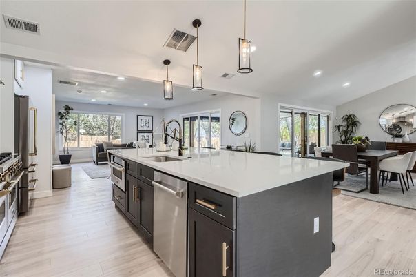 Dining room, Interior, Kitchen, Living room, Pendant Lights, Recessed Lighting, Stainless Steel Appliances, Wood Texture Flooring