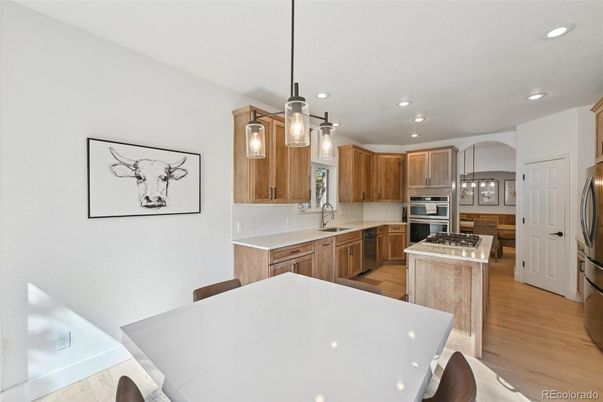 Interior, Kitchen, Pendant Lights, Recessed Lighting, Stainless Steel Appliances, Wood Texture Flooring
