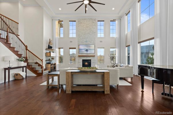 Fireplace, Interior, Living room, Piano, Recessed Lighting, Wood Texture Flooring