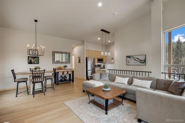 Dining room, Interior, Kitchen, Living room, Pendant Lights, Recessed Lighting, Stainless Steel Appliances, Wood Texture Flooring