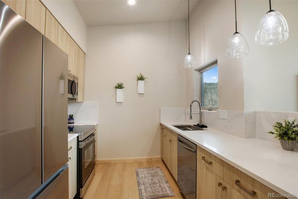 Interior, Kitchen, Pendant Lights, Recessed Lighting, Stainless Steel Appliances, Wood Texture Flooring
