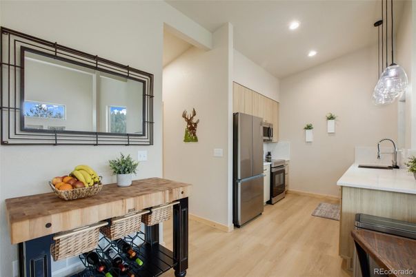 Interior, Kitchen, Pendant Lights, Recessed Lighting, Stainless Steel Appliances, Wood Texture Flooring