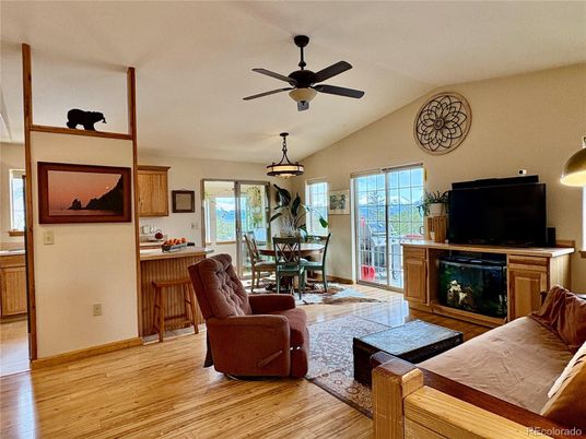 Dining room, Fireplace, Interior, Kitchen, Living room, Pendant Lights, Wood Texture Flooring