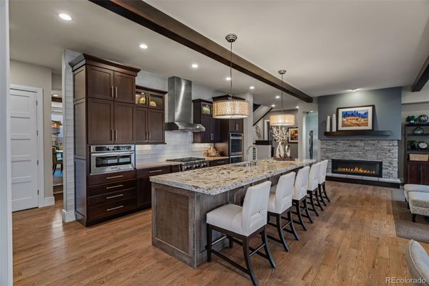 Fireplace, Interior, Kitchen, Pendant Lights, Recessed Lighting, Stainless Steel Appliances, Wood Texture Flooring