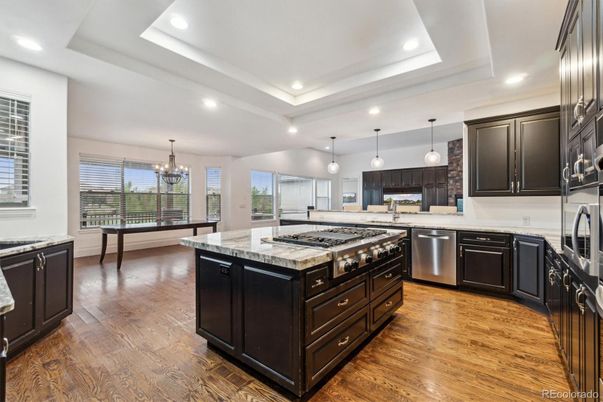 Chandelier, Interior, Kitchen, Pendant Lights, Recessed Lighting, Stainless Steel Appliances, Wood Texture Flooring