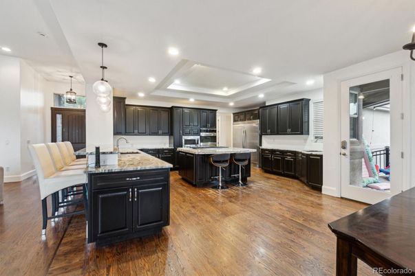 Interior, Kitchen, Pendant Lights, Recessed Lighting, Stainless Steel Appliances, Wood Texture Flooring