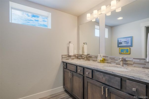 Bathroom, Dual Sink Vanities, Interior, Recessed Lighting, Wood Texture Flooring