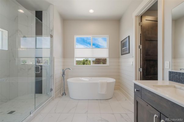 Bathroom, Free Standing Baths, Glass Shower, Interior, Marble, Marble Walls, Recessed Lighting