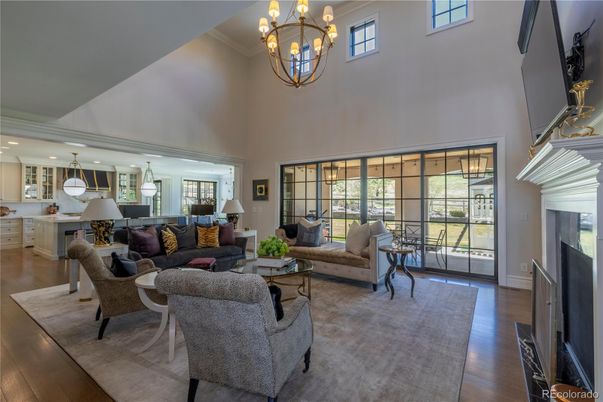 Chandelier, Fireplace, Interior, Kitchen, Living room, Pendant Lights, Recessed Lighting, Wood Texture Flooring