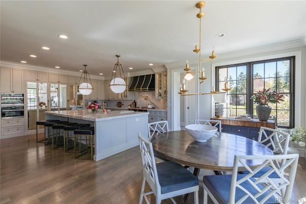 Dining room, Interior, Kitchen, Pendant Lights, Recessed Lighting, Stainless Steel Appliances, Wood Texture Flooring