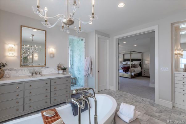 Bathroom, Bedroom, Chandelier, Dual Sink Vanities, Free Standing Baths, Interior, Marble, Recessed Lighting