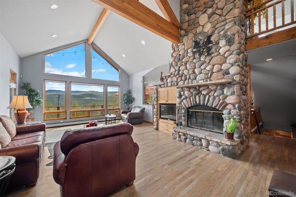 Fireplace, Interior, Living room, Recessed Lighting, Stone Walls, Wooden Beams, Wood Texture Flooring