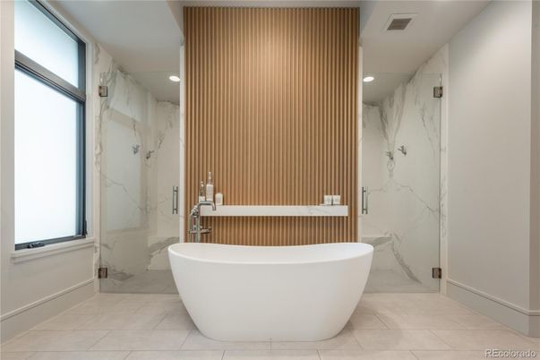 Bathroom, Free Standing Baths, Glass Shower, Interior, Marble Walls, Recessed Lighting