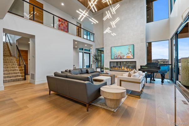 Fireplace, Interior, Living room, Pendant Lights, Piano, Recessed Lighting, Stone Walls, Wood Texture Flooring