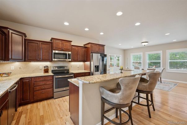 Dining room, Interior, Kitchen, Recessed Lighting, Stainless Steel Appliances, Wood Texture Flooring