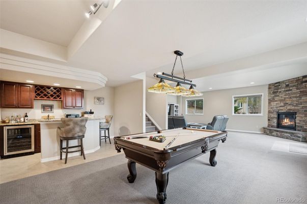 Billiard Table, Fireplace, Game Room, Interior, Pendant Lights, Recessed Lighting, Stone Walls