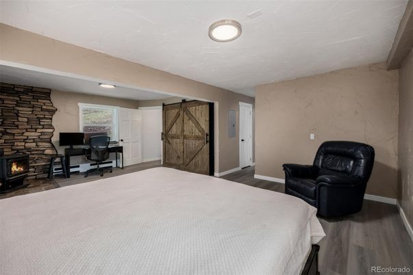 Bedroom, Fireplace, Home Office, Interior, Stone Walls, Wood Texture Flooring