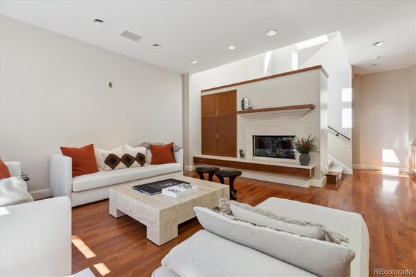 Fireplace, Interior, Living room, Recessed Lighting, Wood Texture Flooring