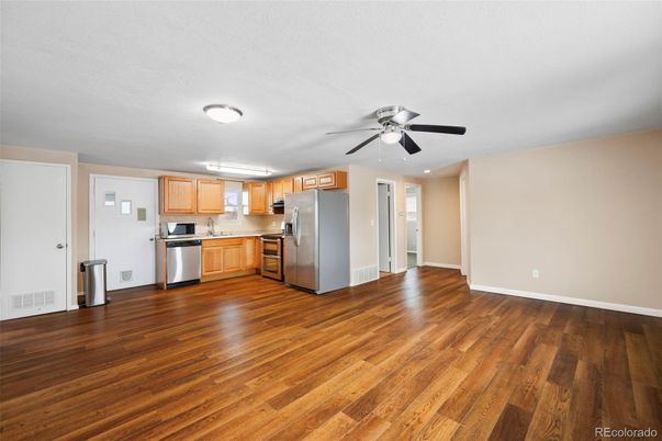 Empty room, Interior, Kitchen, Stainless Steel Appliances, Wood Texture Flooring