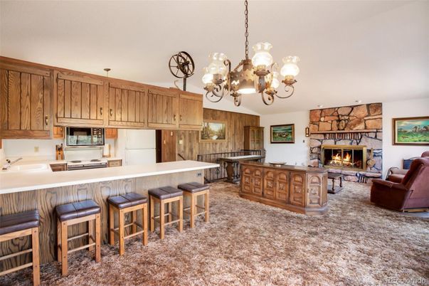 Chandelier, Fireplace, Interior, Kitchen, Living room, Stone Walls