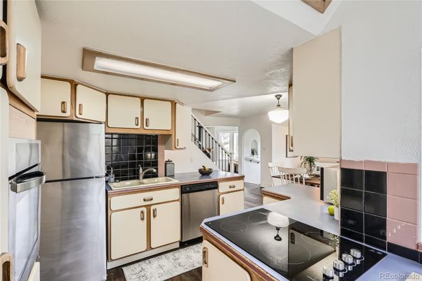 Dining room, Interior, Kitchen, Pendant Lights, Stainless Steel Appliances, Wood Texture Flooring