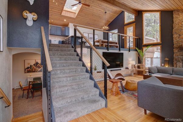 Dining room, Fireplace, Interior, Kitchen, Living room, Pendant Lights, Recessed Lighting, Stone Walls, Wooden Ceilings, Wood Texture Flooring