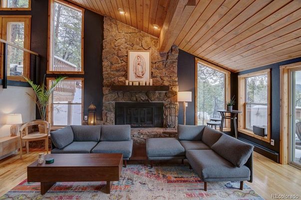 Fireplace, Interior, Living room, Recessed Lighting, Stone Walls, Wooden Ceilings, Wood Texture Flooring