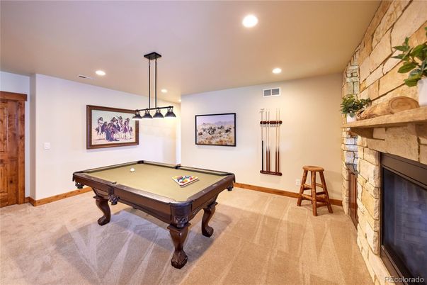 Billiard Table, Fireplace, Game Room, Interior, Pendant Lights, Recessed Lighting, Stone Walls