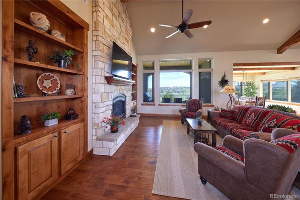 Fireplace, Interior, Living room, Recessed Lighting, Stone Walls, Wooden Beams, Wood Texture Flooring