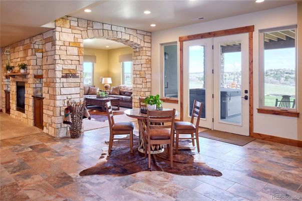 Dining room, Fireplace, Interior, Recessed Lighting, Stone Walls