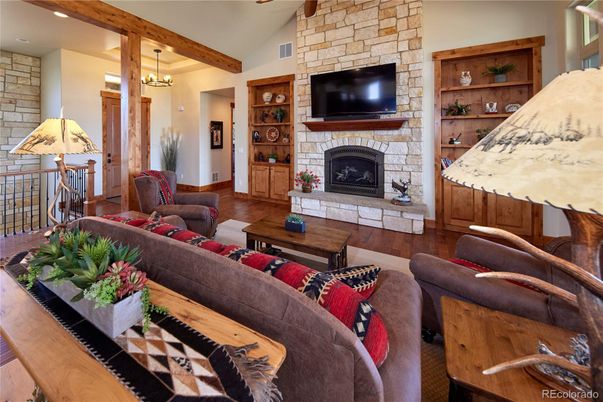 Fireplace, Interior, Living room, Recessed Lighting, Stone Walls, Wooden Beams, Wood Texture Flooring