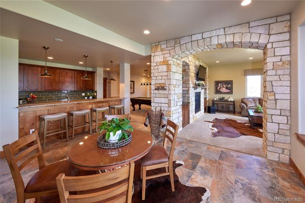 Dining room, Interior, Kitchen, Pendant Lights, Recessed Lighting, Stone Walls, Wood Texture Flooring