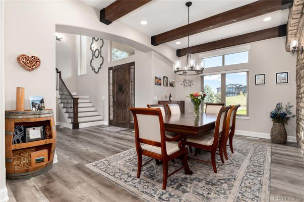 Chandelier, Dining room, Interior, Pendant Lights, Recessed Lighting, Wooden Beams, Wood Texture Flooring