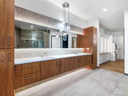 Bathroom, Dual Sink Vanities, Interior, Pendant Lights, Recessed Lighting, Wood Texture Flooring