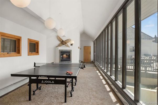 Fireplace, Game Room, Interior, Pendant Lights