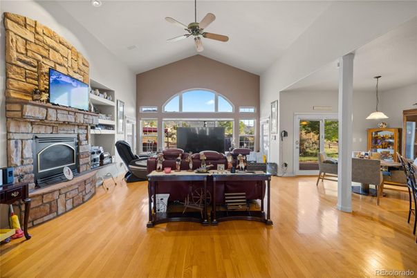 Dining room, Fireplace, Interior, Pendant Lights, Stone Walls, Wood Texture Flooring