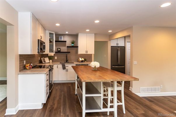 Interior, Kitchen, Recessed Lighting, Stainless Steel Appliances, Wood Texture Flooring